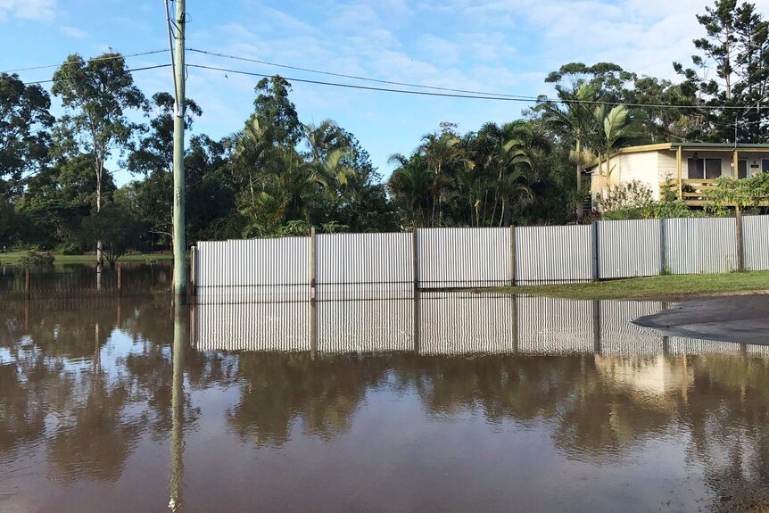 Floodwaters in a street at Waterford West at Logan, south of Brisbane, on April 2, 2017