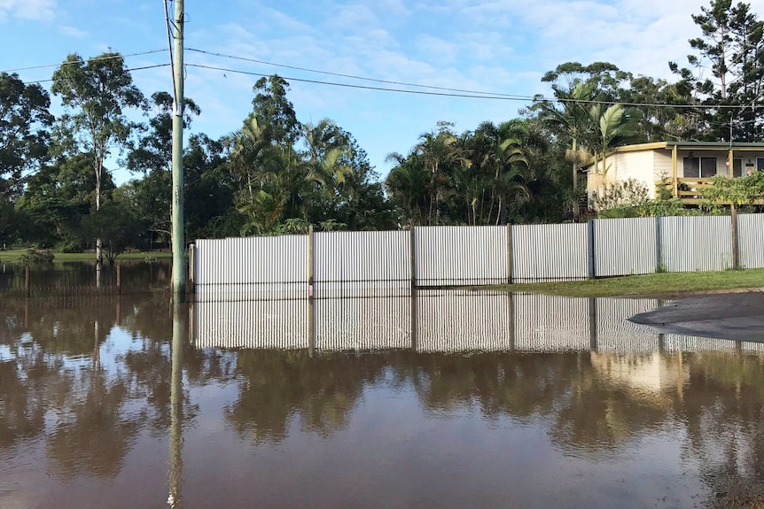 Floodwaters in a street at Waterford West at Logan, south of Brisbane, on April 2, 2017