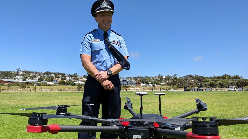 WA Police Officer Glenn Spencer with the larger drone.