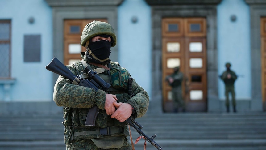 Armed soldier outside Crimean government building