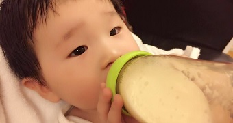 Chinese baby drinking baby formula