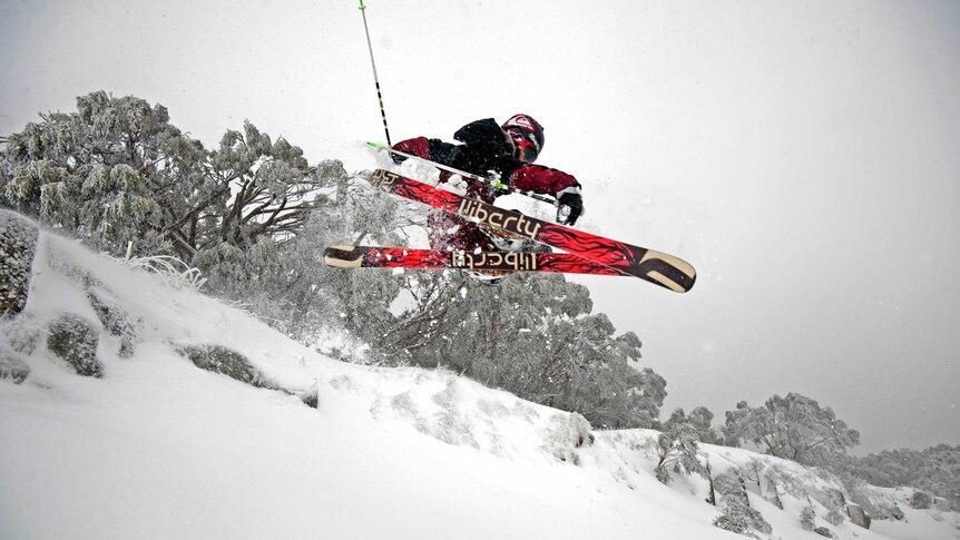 Mitch Reeves rides in fresh snow at Mt Buller.