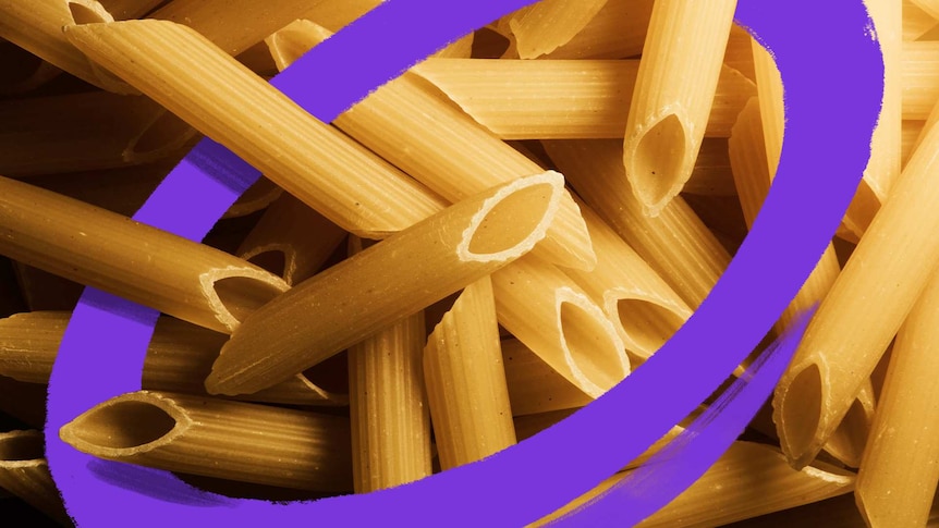 A close up photo of dried penne pasta, bought to cook during coronavirus.