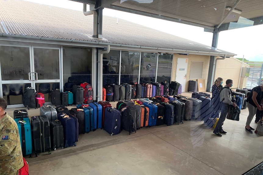 luggage is seen outside a bus.