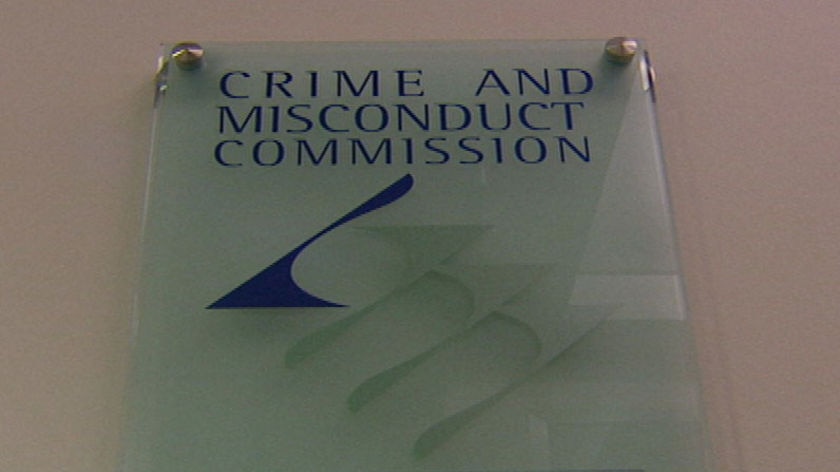 TV still of CMC sign outside the Brisbane office of Qld's Crime and Misconduct Commission.
