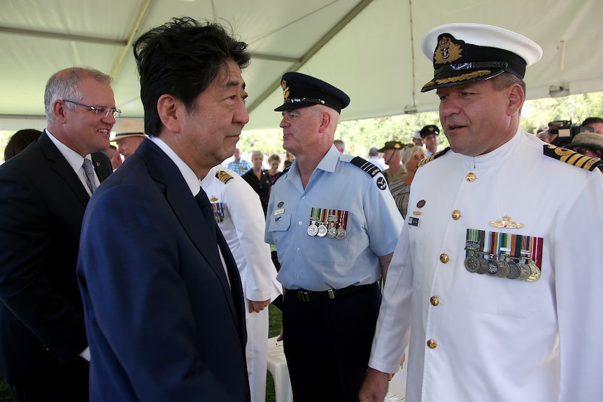 Japan's Prime Minister Shinzo Abe meets with Australian defence force personnel