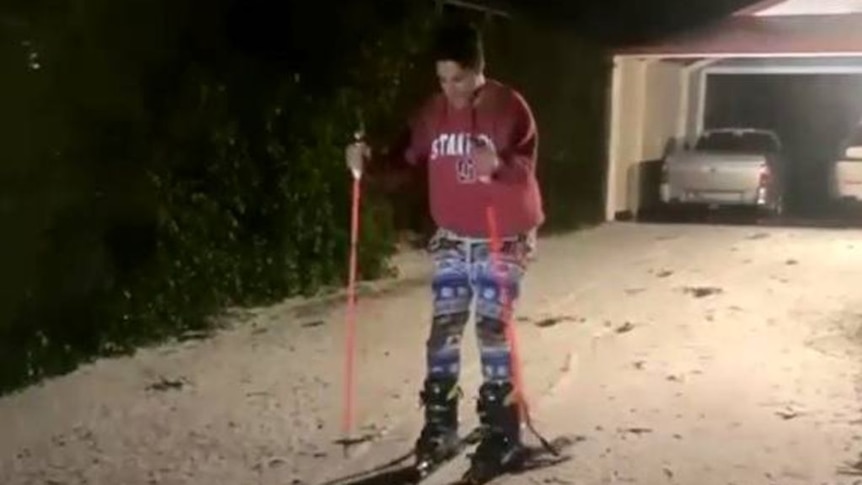 Ice turns Adelaide Hills street into makeshift ski run after mini tornadoes