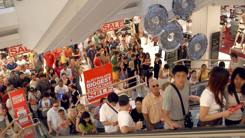 Crowds queue for the escalator in a Brisbane department store moments after doors opened for the Boxing Day sales, December 26, 2008.