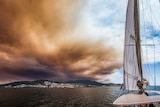 Gell River bushfire smoke over Mount Wellington and Hobart seen from the River Derwent.