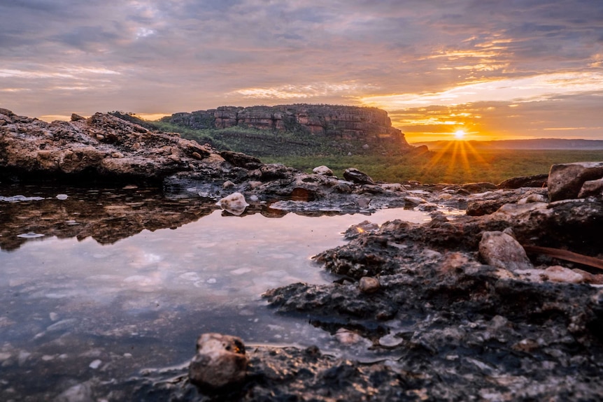 The sun sets over Kakadu National Park.