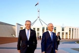Scott Morrison and Malcolm Turnbull walking in front of Parliament House the day after the 2016 budget.