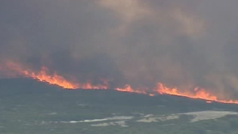 Ten metre high fires are threatening homes in Albany, WA.