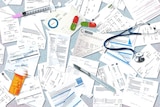 An assortment of medical bills laid out.
