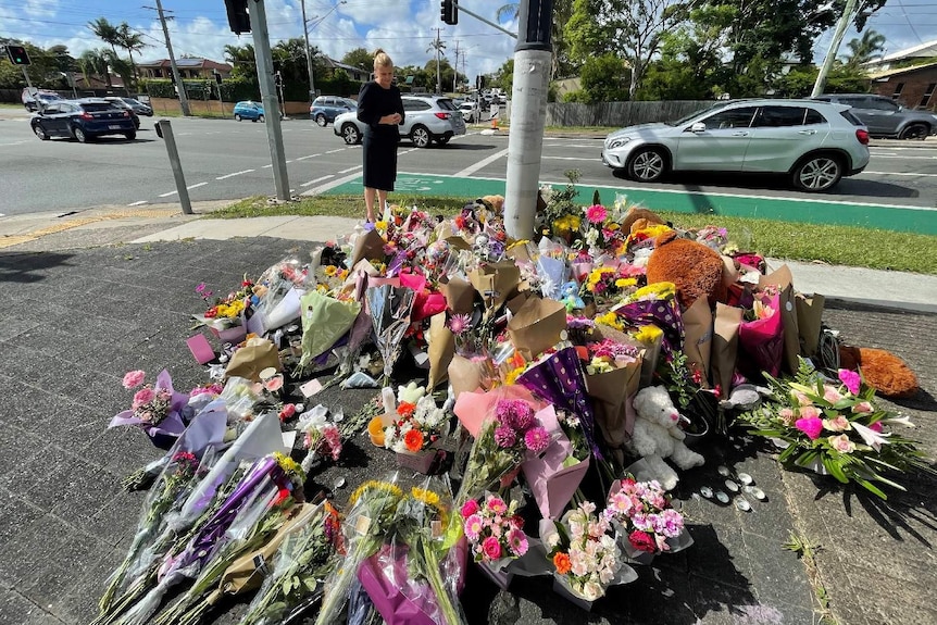 Flowers left at the intersection where Matthew Field and Katherine Leadbetter died on Tuesday evening.