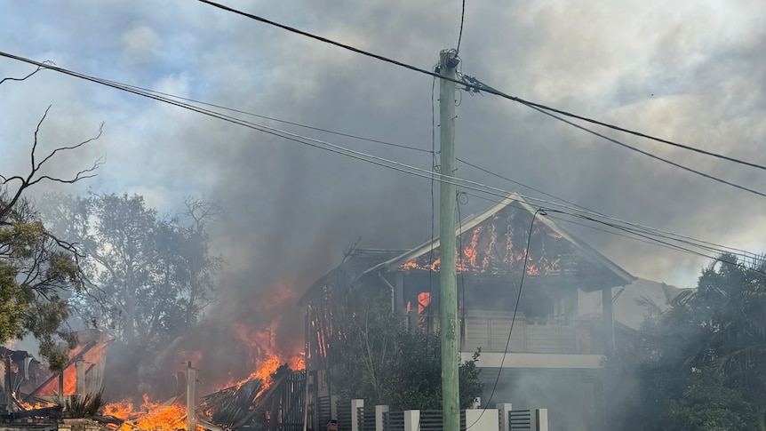 a suburban house ablaze