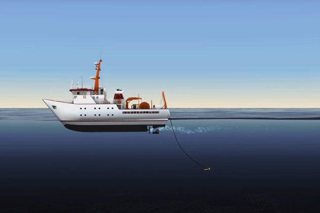 A still of an animation of a vessel lowering a device on a cable into the ocean. 