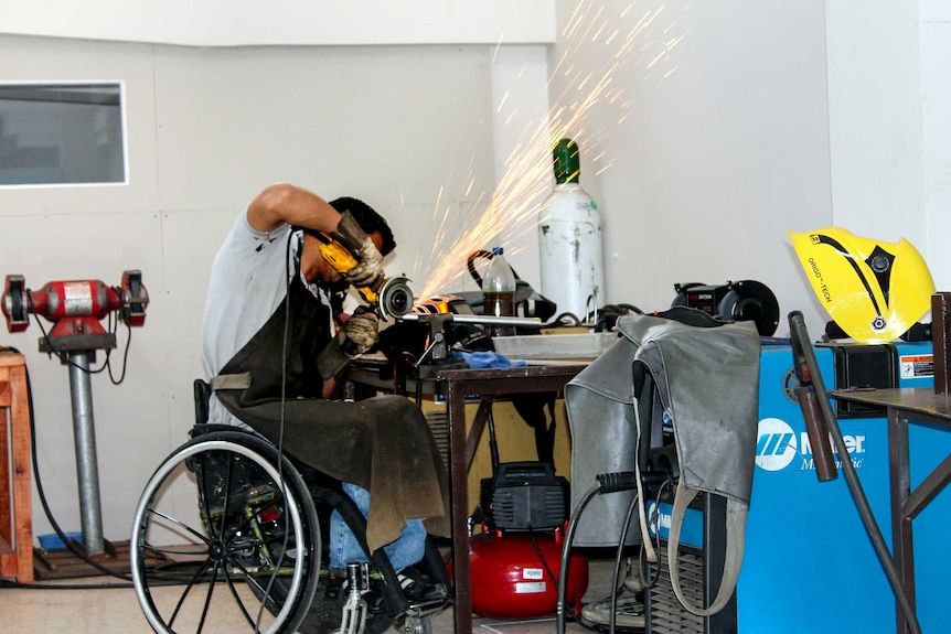 A worker in a Guatemalan wheelchair factory.