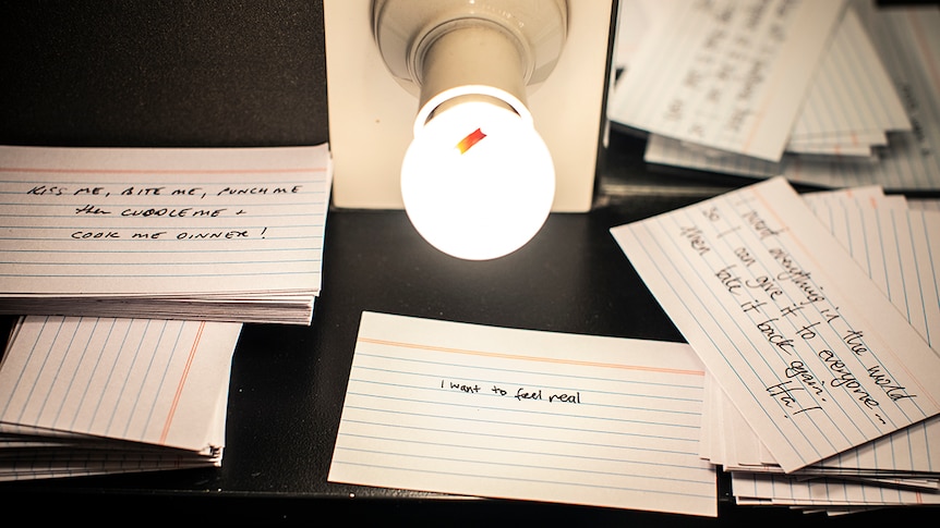 Colour photo of cue cards on dressing room table.
