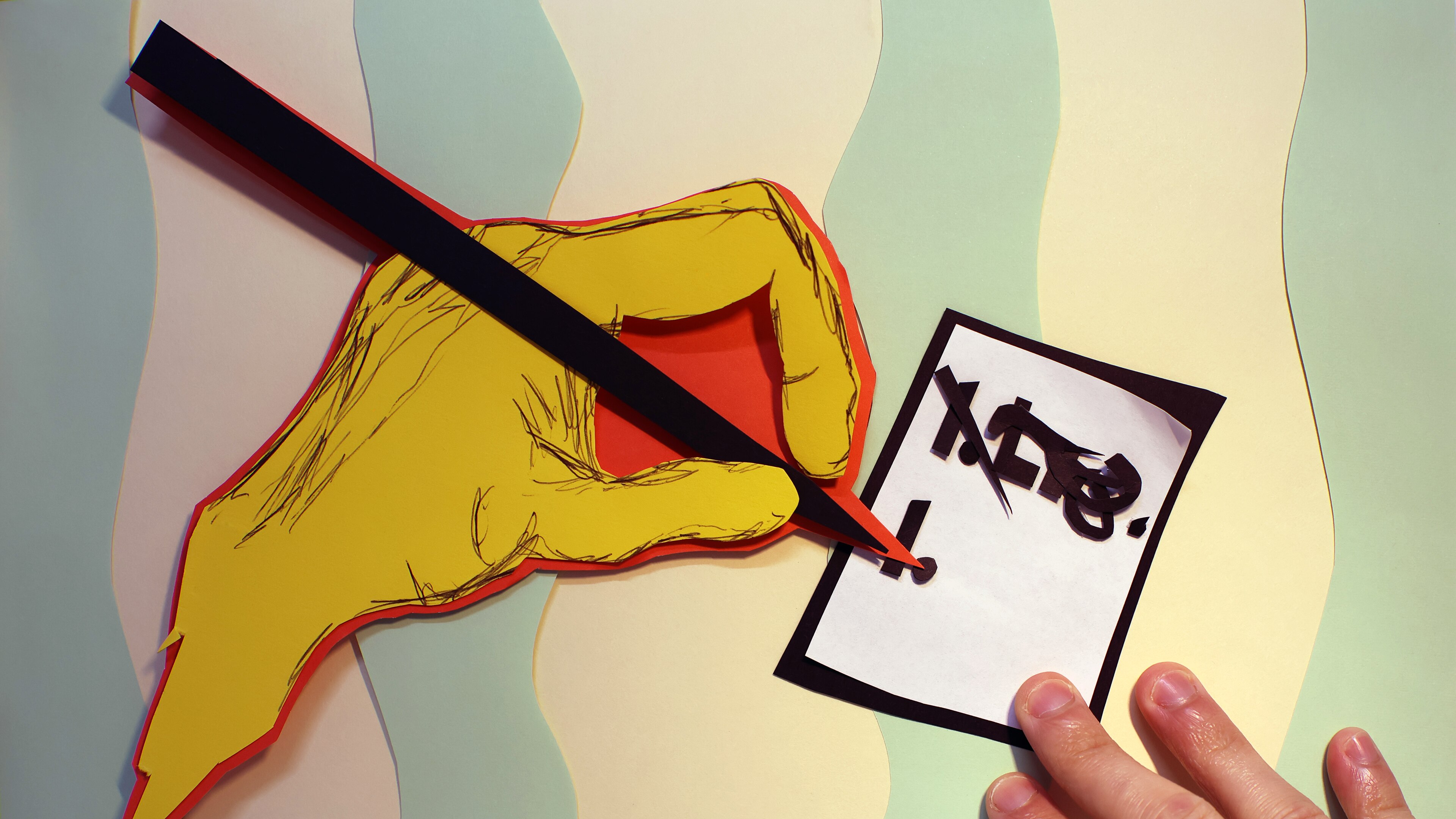 An artwork shows a hand holding a pen writing a list. In the image a persons real hand can be seen at the bottom.