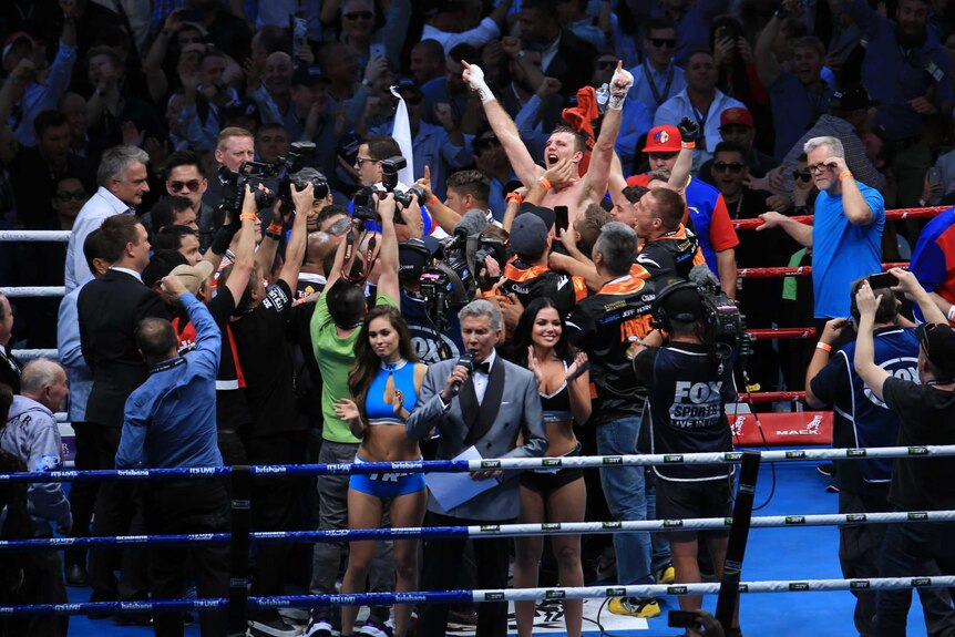 Jeff Horn is held aloft after beating Manny Pacquiao at Lang Park.