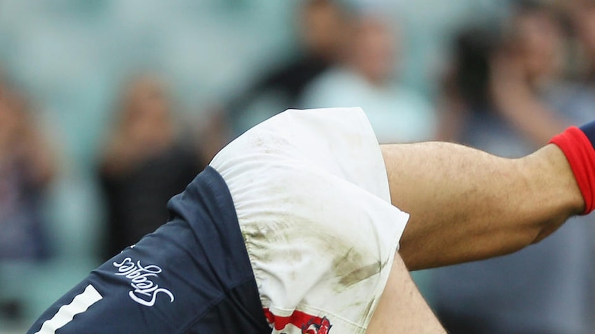 On a roll ... Anthony Minichiello got across the line for the Roosters in their narrow win.