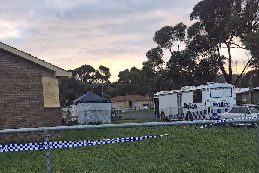 Police outside a house where a body was found in Clarendon Vale