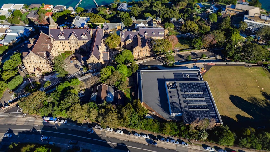 Birds-eye view of the solar panels on top of the fitness facility of Kincoppal Rose Bay school