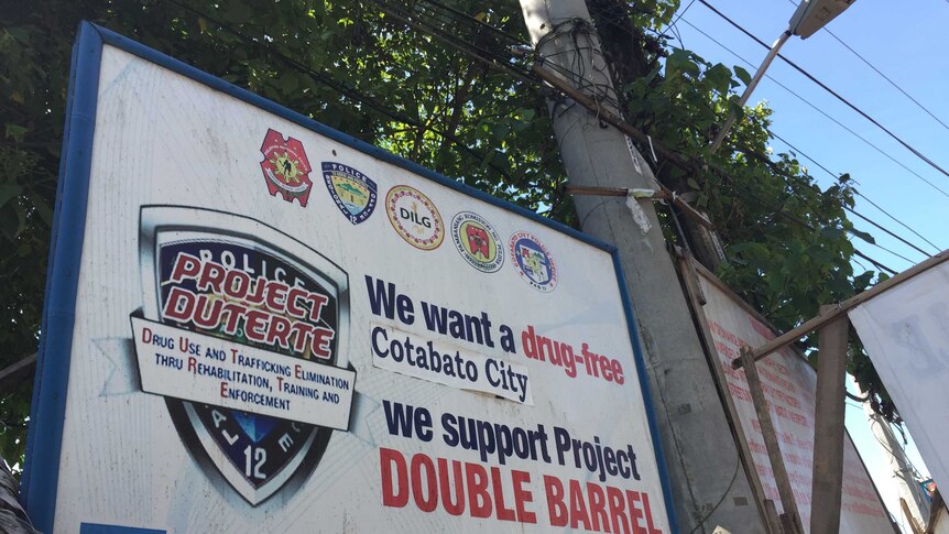 A sign declaring Cotabato City's support for Filipino president Rodrigo Duterte's drug war.