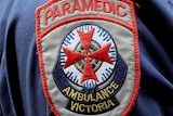 Victoria ambulance paramedic badge on the sleeve of an officer's shirt