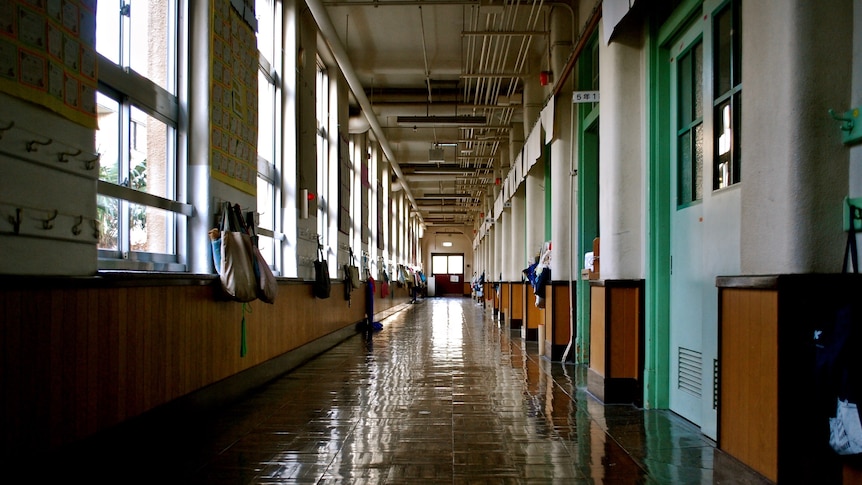 An empty school corridor.