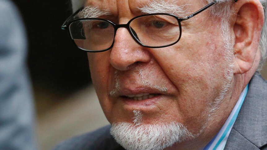 Rolf Harris leaves Southwark Crown Court in London after being found guilty.