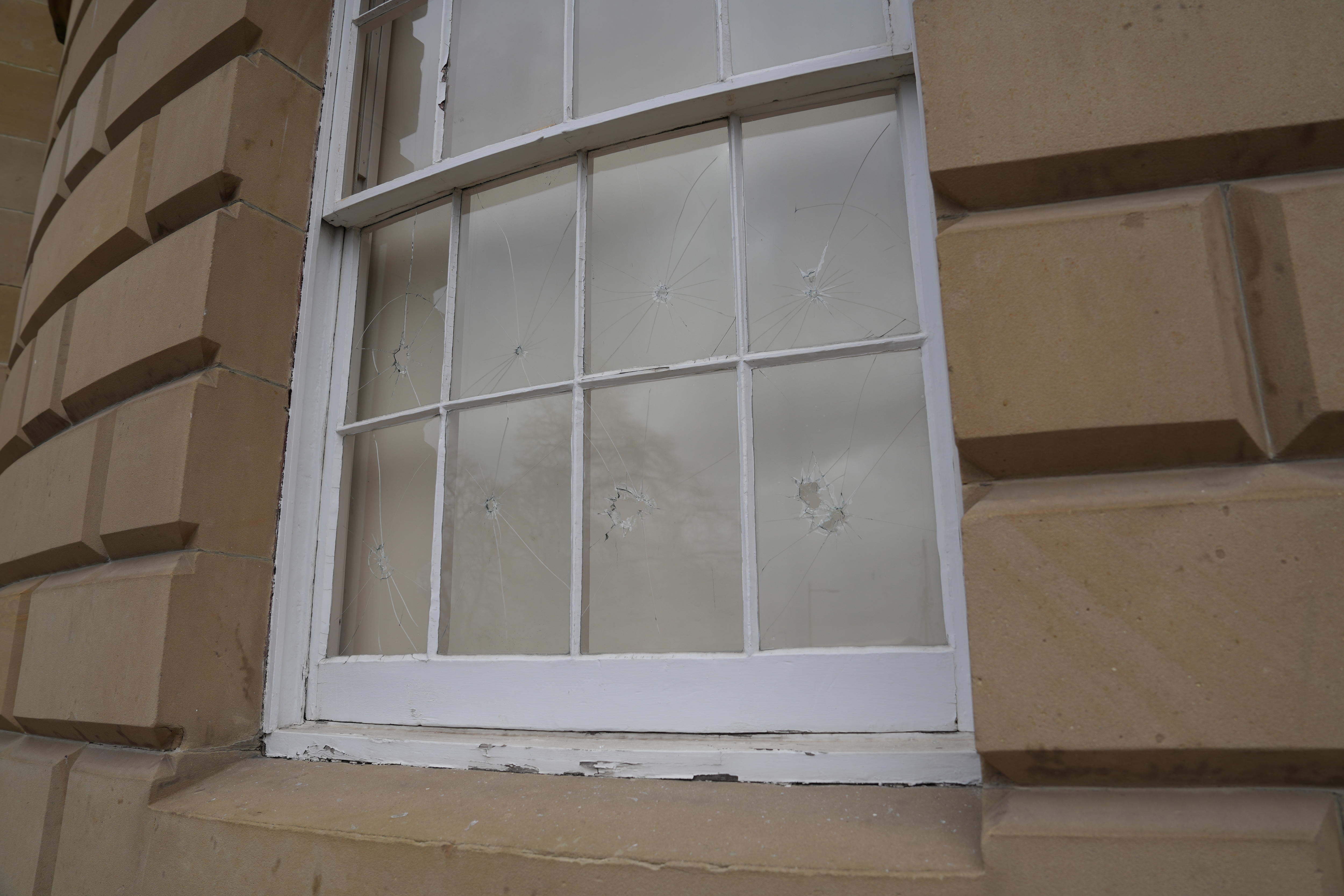 Smashed windows at parliament house in Hobart.