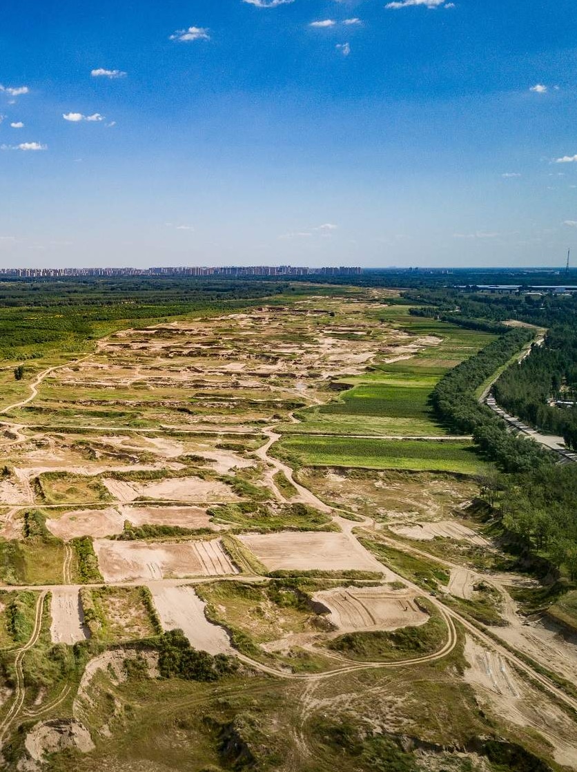 Square-shaped dry farming beds along a long stretch of the dry Yongding River.