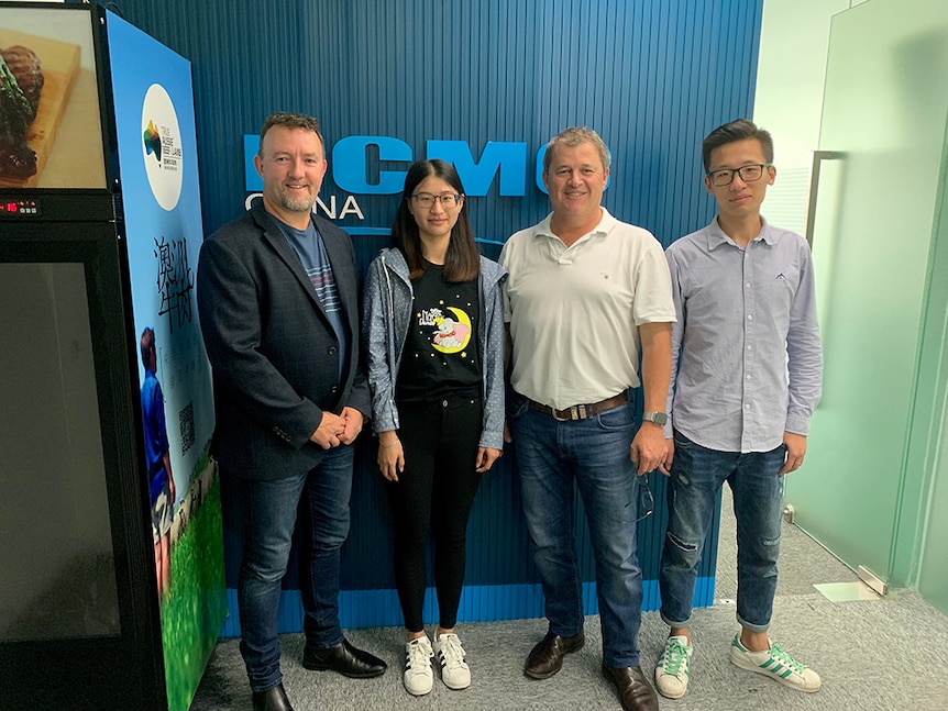 Simon Stahl and staff at the co-operative's Shanghai office.