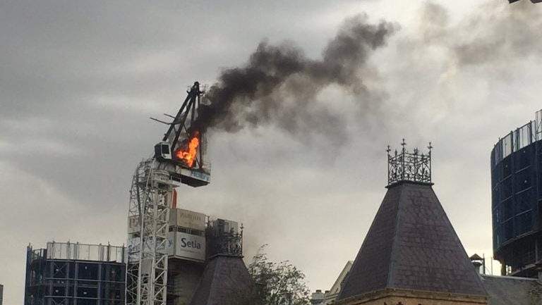 Fire on a crane on St Kilda Road in Melbourne