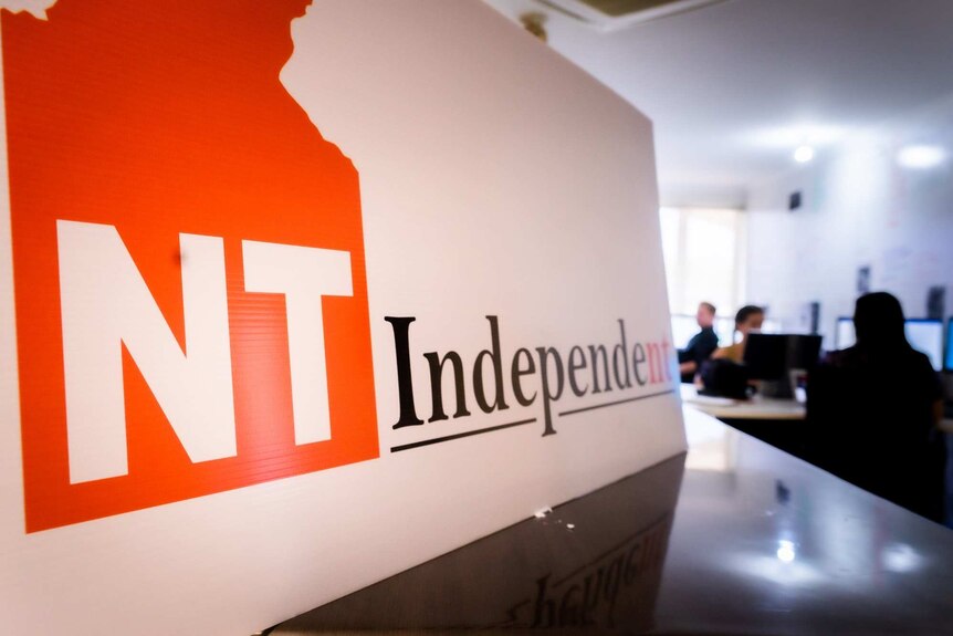 A sign with 'NT Independent' written on it at the front of the publication's newsroom.