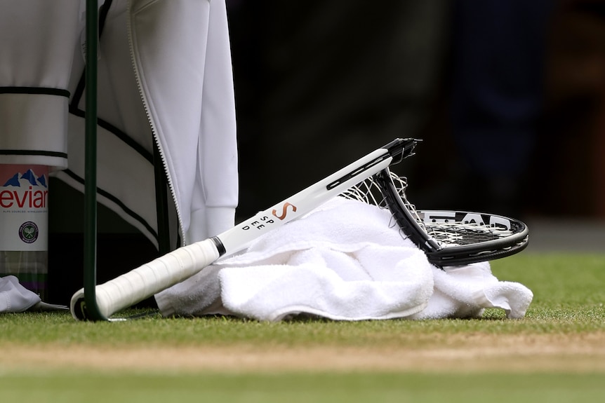  Novak Djokovic of Serbia's smashed racket during the Men's Singles Final against Carlos Alcaraz of Spain .