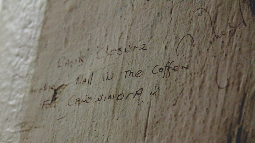 An inscription inside the safe which reads "bank closure another nail in the coffin for Canowindra".