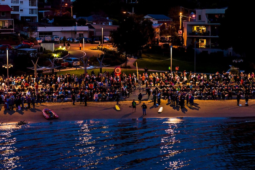 Participants wait for start of Dark Mofo 2018 nude swim.