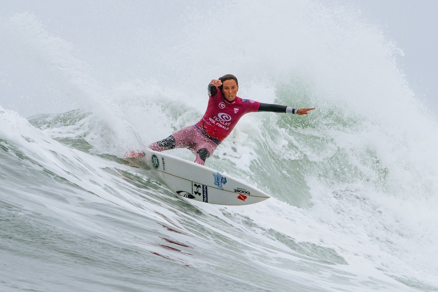 Sally Fitzgibbons surfing in the WSL finals series at Lower Trestles in California