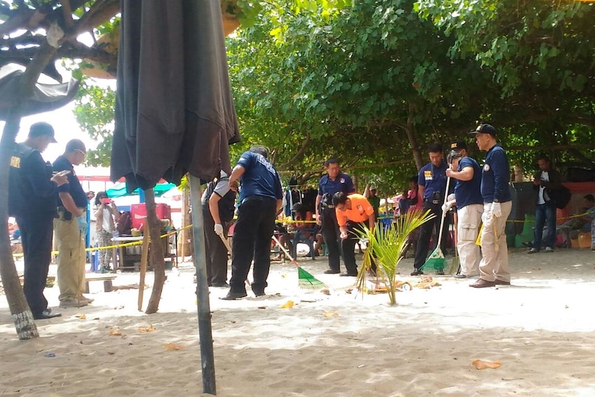 Police at scene where Bali police officer Wayan Sudarsa died
