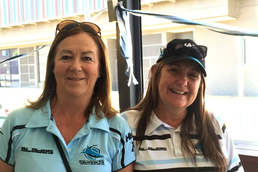 Sharks fans Dale Prior (L) and Debbie Feening ahead of the NRL grand final.