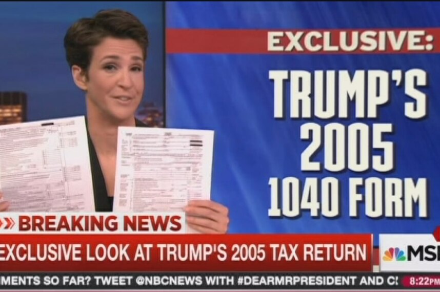 MSNBC host Rachel Maddow holds up two pages of Donald Trump's 2005 tax return
