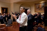 Hard-won victory: Barack Obama and vice-president Joe Biden after the healthcare vote