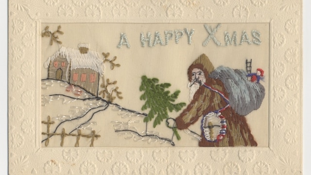 Embroidered silk postcard with Santa and little cottage