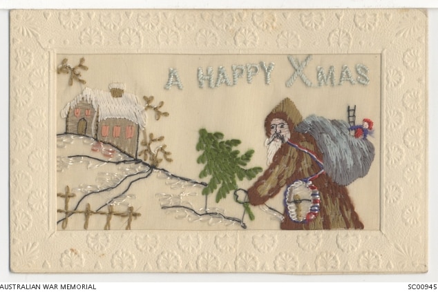 Embroidered silk postcard with Santa and little cottage