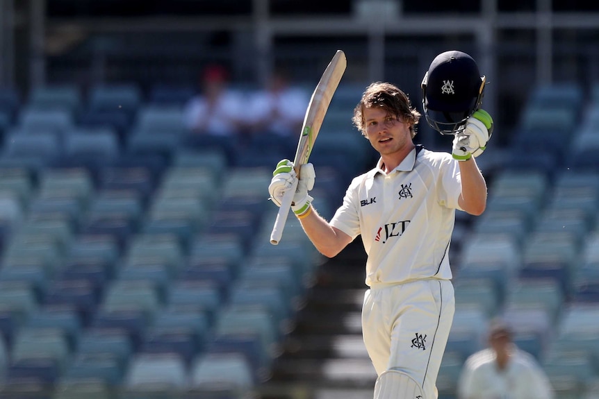 Will Pucovski raises his bat to acknowledge the WACA crowd after reaching a double century for Victoria.