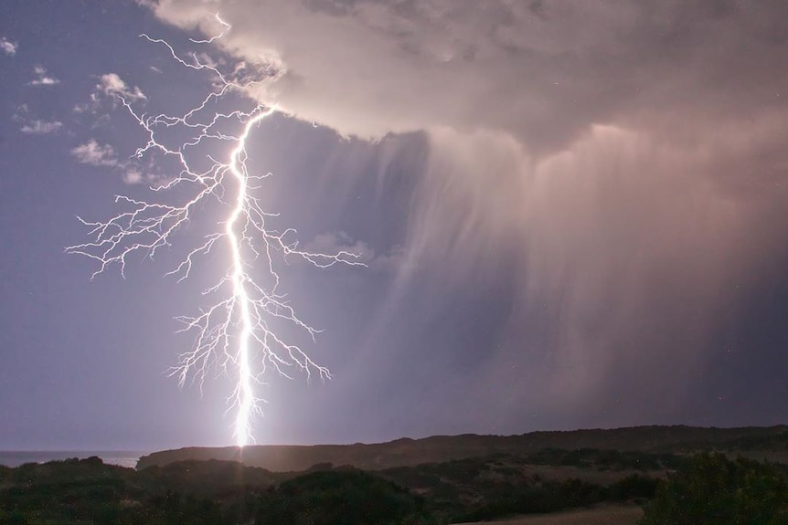 A lightning strike over landscape at Sheringa, on South Australia's Eyre Peninsula.