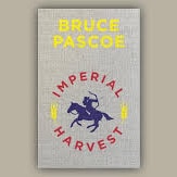 A grey book cover with bold yellow text spelling Imperial Harvest and a printedimage of a man on a horse in blue