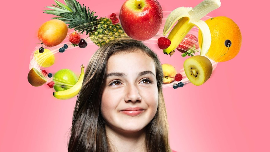 Girl with fruit circling her head